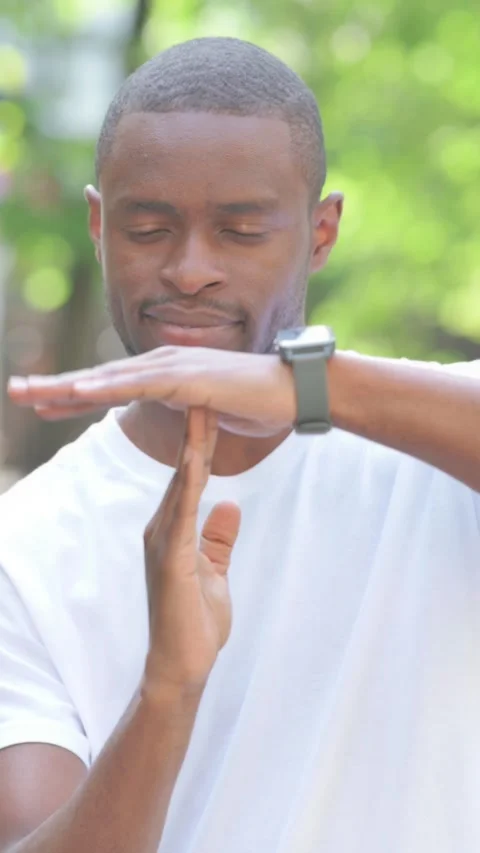 Time out Gesture by Young African Man Outdoor, Vertical Video Stock Footage 319022862