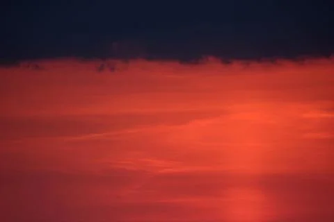 As time passed, the sunlight waned, leaving a serene red glow on the evening  Stock Photos