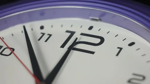 Time passes, on the clock twelve hours Stock Footage 99993704
