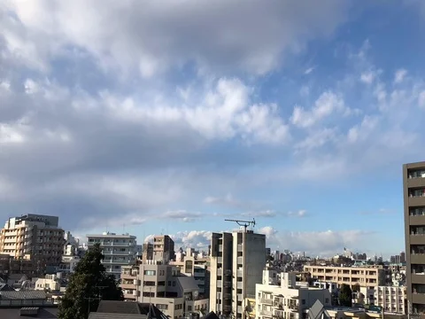 Time passes quickly as day turns to  to evening over an inner city suburb Stock Footage 83962103