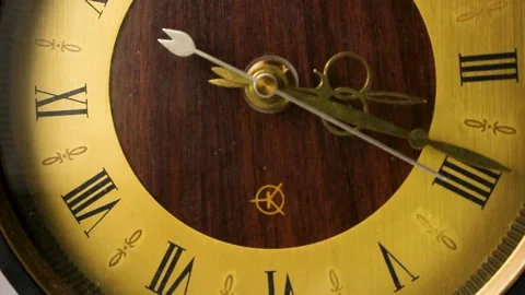 Time passing concept showing movement of hands on classic timepiece face Stock Footage 335541234