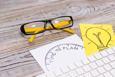 Time to plan drawing with a light bulb Stock Photos