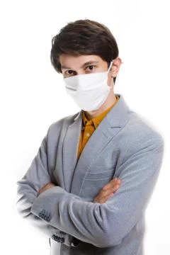 Is time to protect all the time. elegant man wearing a mouth protection to pr Stock Photos