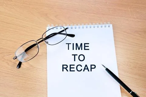Time to recap text on notebook page Stock Photos
