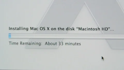 Time remaining installing on disk Apple MacOS on iMac computers Stock Footage 107783407