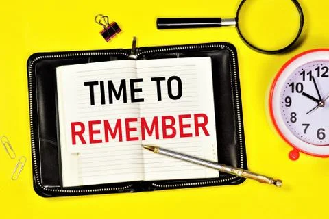 Time to remember. Text label in the planning Notepad. Stock Photos