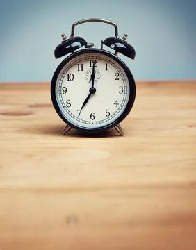 Time, reminder and clock on desk, home and punctual with analog, wireless and Foto stock
