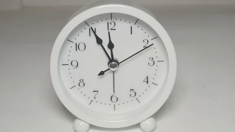 Time running on white clock. 20x speed up Stock Footage 128446177