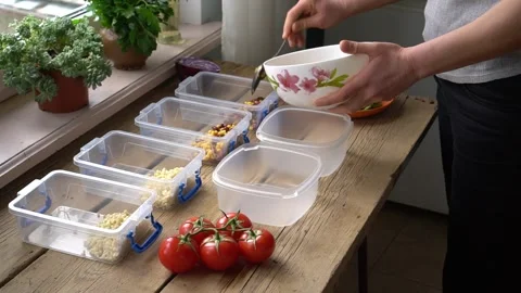 Time Saving Meal Prep. Cook once, eat for several days. Meal Prep Containers Stock Footage 316809894