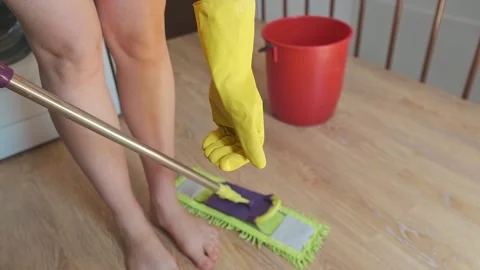 Time-saving tip for home cleaning, regular floor washing prevents buildup of tou Stock Footage 301868425