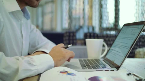 Time to sign some contracts. Pensive young handsome man signing documents while Stock Footage 68860120
