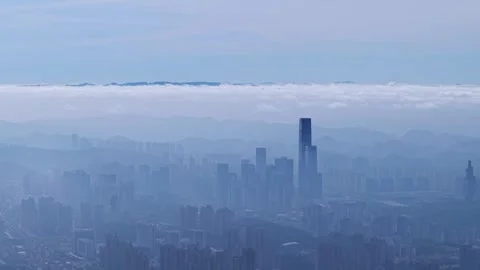 Time-space dialogue between steel forest and windmill mountains Stock Footage 311754143