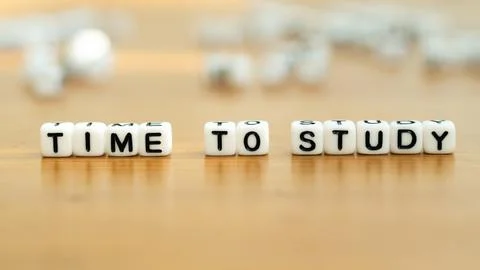 Time to study slogan in white block letter beads Stock Photos
