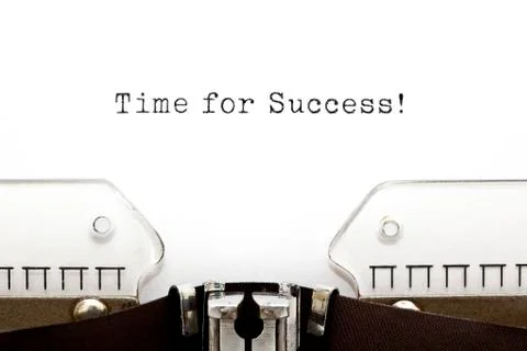 Time for success typewriter Stockfoto's
