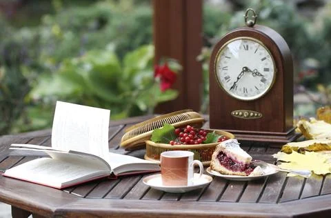 Time For Tea. Still life with a clock Foto stock