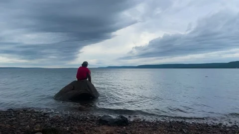 Time to think, alone by the sea. Stock Footage 156618906