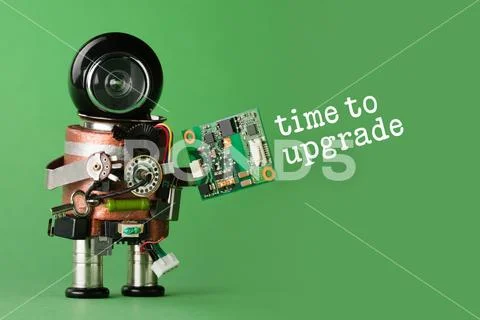 Time to upgrade concept. Robot with abstract circuit chip. retro style toy Stock Photos