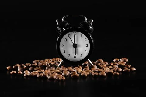 Time to wake up. lack old style alarm clock isolated on black. clock with c.. Stock Photos