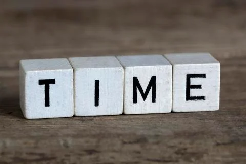 Time, written in cubes Stock Photos