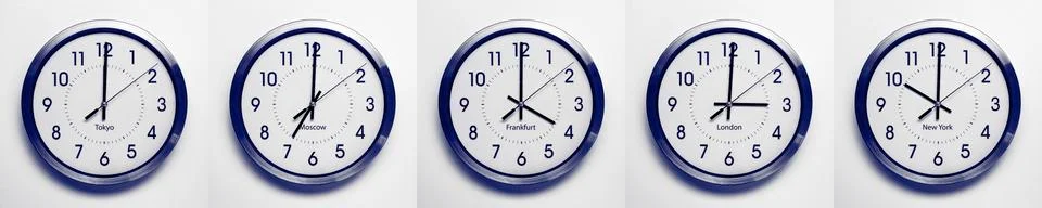 Time zone clocks Stock Photos
