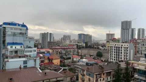 Timelabs, clouds float across the sky over the city Stock Footage 168642062