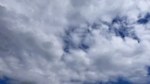 Timelabs white clouds fly quickly across sunny blue sky on summer day 8 Stock Footage 311366623