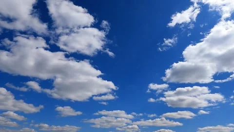 Timelabs white clouds fly quickly across sunny blue sky on summer day 1 Stock Footage 311366681