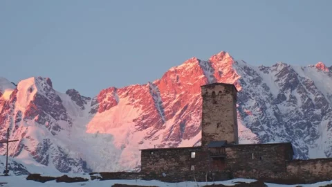 Timelapae zoom in view Lamaria monastery with Shkhara peak during sunset in.. Stock-Footage 329952309