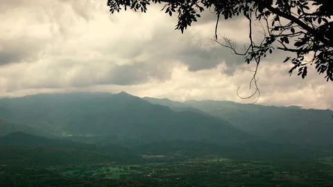 Timelape of the cloud over the tropical mountain in restro tone. Stock Footage 83568986