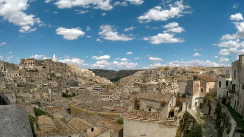 Timelaps 4k panoramic view of the stones of Matera and the rock churches Video stock 160025635