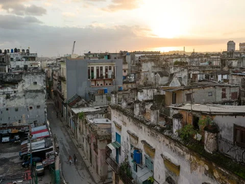 Timelaps bird's-eye view of dilapidated streets in downtown at Havana dawn sun Stock Footage 71084851