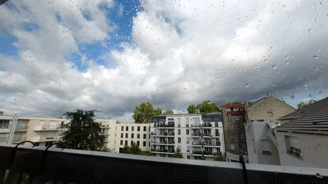 Timelaps of the clouds during good weather from a balcony in Paris Stock Footage 139981402