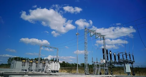 Timelaps industrial high-voltage substation power transformer at the power plant Stock Footage 101683417