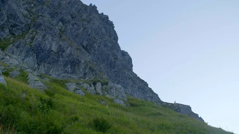 Timelaps of mountainside with standing two goats 4k HDR H264 Stock Footage 88269822