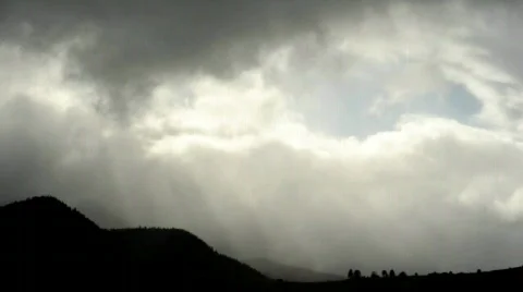 Timelaps of moving clouds in mountains Stock Footage 841309