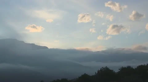 Timelaps of moving fog in mountains Stock Footage 11418836