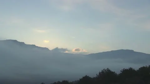 Timelaps of moving fog in mountains Stock Footage 11422552