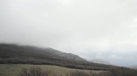 Timelaps of moving fog in mountains Stock Footage 22428862