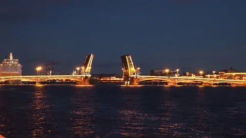 TimeLaps. The ship sails through the drawbridge at night. Saint-Petersburg Stock Footage