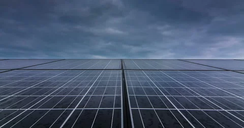 Timelaps of solar cell panel with dark sky to clear sky Stock Footage 65374875