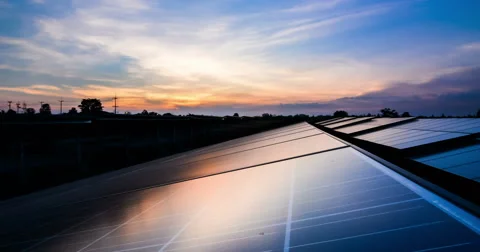 Timelaps of solar cell panel with sunrise and sunset Stock Footage 65372089