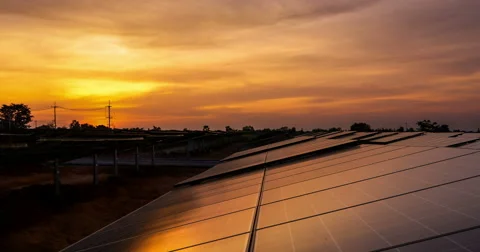 Timelaps of solar cell panel with sunrise and sunset Stock Footage 65372433