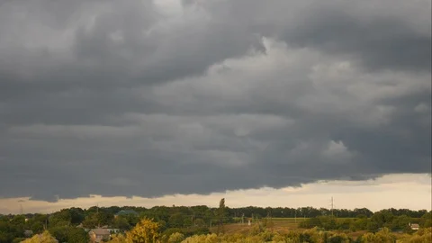 Timelaps stormy, dark, gray clouds move fast Video stock 115986686