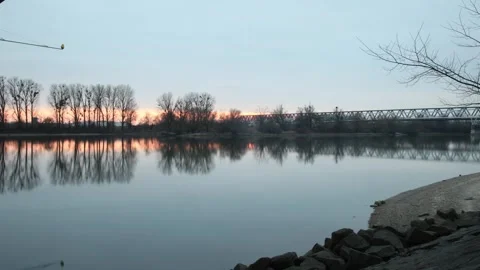 Timelaps of sun set on the Danube River in winter time Stock Footage 302511574