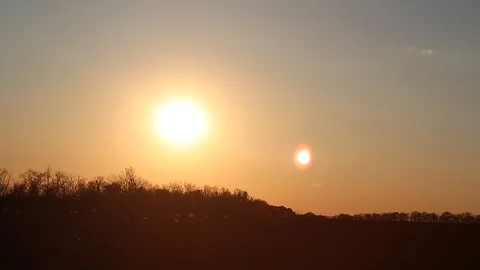 Timelaps sunset over the field horizon Stock Footage 130071671