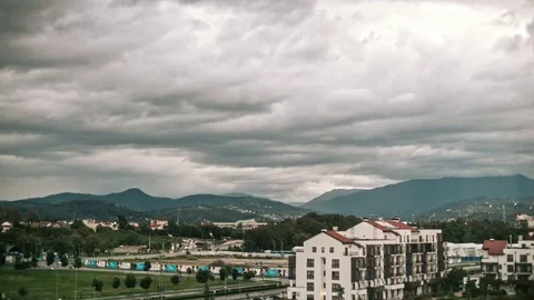 Timelaps, villages in the mountains, when it rains and the sun shines in the Stock Footage 82656425