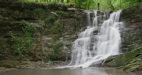 Timelaps of the waterfall in the wood, spring, 4k Video stock 89750041