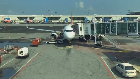 Timelaps : Worker aer working outside of the air port Gate. Stock Footage 91758256