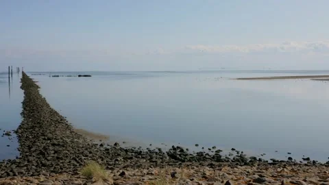 Timelapse, 125x, high tide comes, water level rises, wall is completely flooded, Stock Footage 340927370