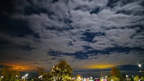 Timelapse, 25 fps. Night clouds over the lights of the night city of Kyiv. Stock Footage 254303333